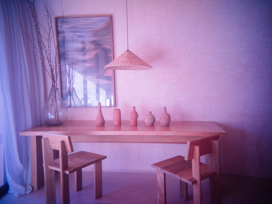 A room with a table and two chairs
