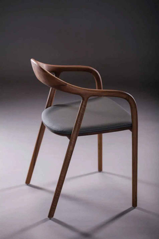 Handcrafted Walnut Armchair – Sculpted Minimalist Design