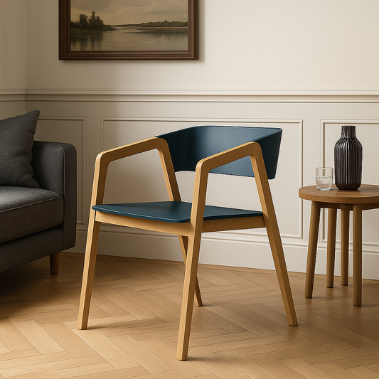 Modern chair with wooden frame and blue seat in a living room setting.